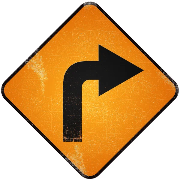 Skręcić w prawo droga. uszkodzony żółty znak metalowe z tur — Zdjęcie stockowe
