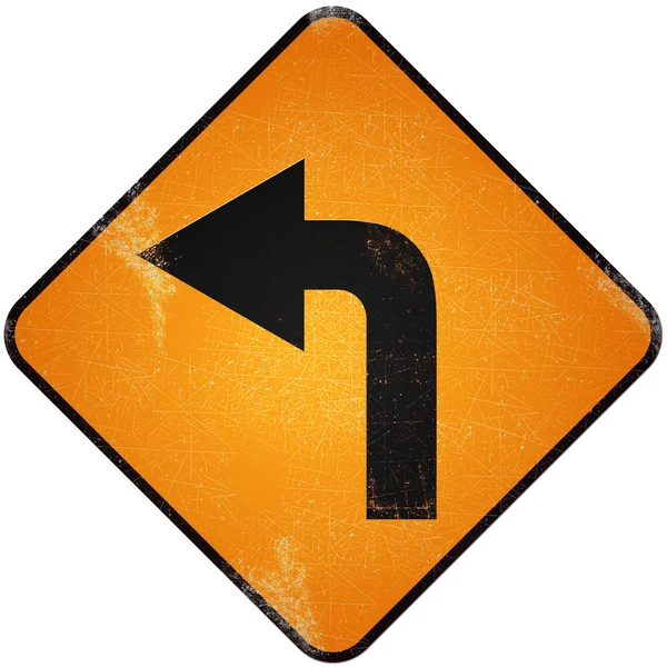 Vire à esquerda. Placa metálica amarela danificada da estrada com volta — Fotografia de Stock