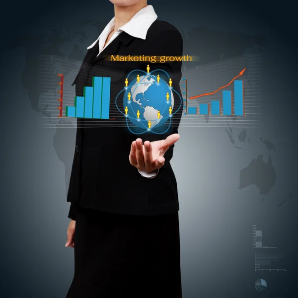 Showing  globe and graph in hand on virtual screen. Concept of m — Stock Photo, Image