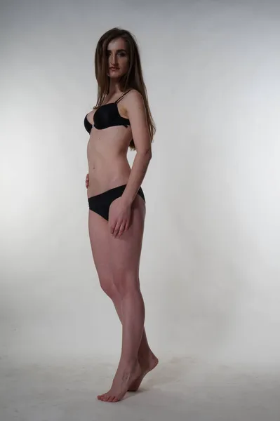 セクシーブルネット女性ポルノの黒ボディスーツ — ストック写真