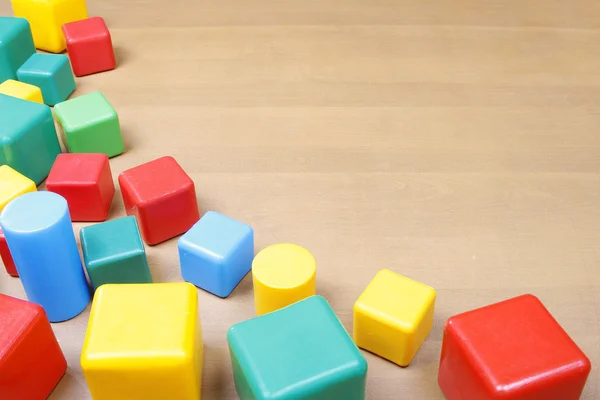 Border of the colorful plastic blocks — Stock Photo, Image