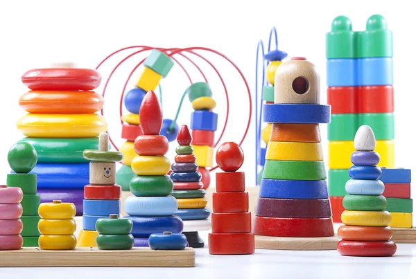 Many Colorful wooden pyramids toy — Stock Photo, Image