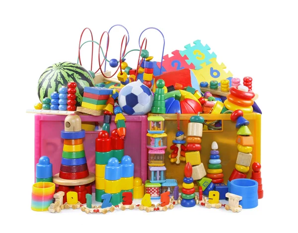 Schachtel mit sehr vielen Spielzeugen lizenzfreie Stockfotos