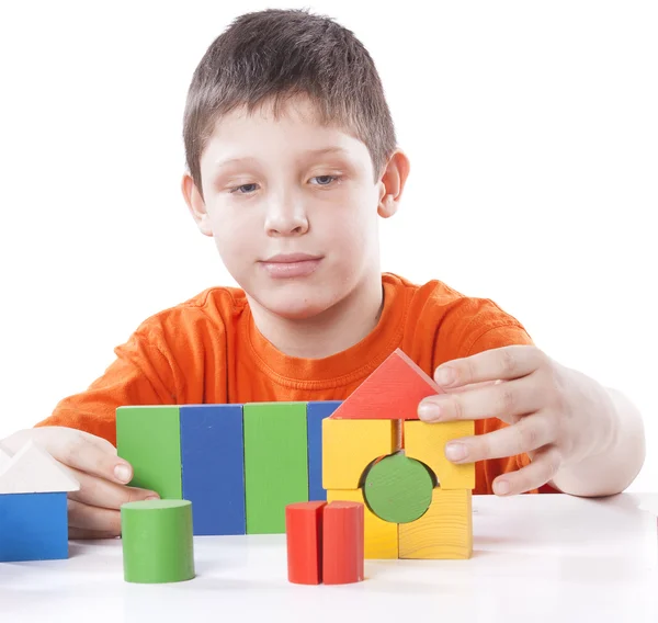 Boy playing toy blocks — Stock Photo, Image