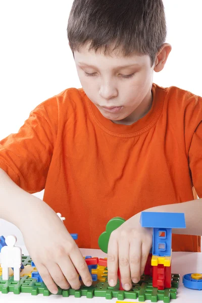 Chico jugando con color juguete —  Fotos de Stock