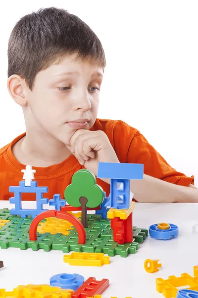 Boy playing with color toy — Stock Photo, Image