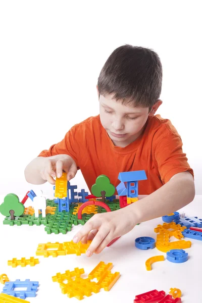 Boy playing with color toy — Stock Photo, Image