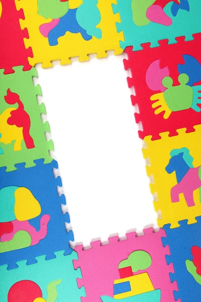 Meerkleurig frame van schuim puzzel — Stockfoto