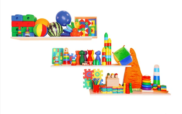 Prateleira com brinquedos — Fotografia de Stock