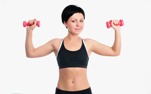 Retrato de una joven fitness con mancuernas — Foto de Stock