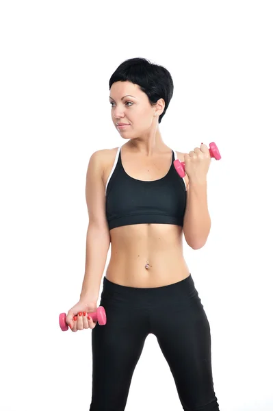 Portrait of young fitness woman with a dumbbells — Stock Photo, Image