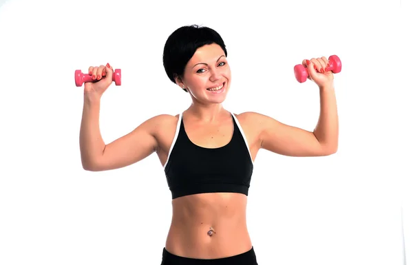 Retrato de una joven fitness con mancuernas — Foto de Stock