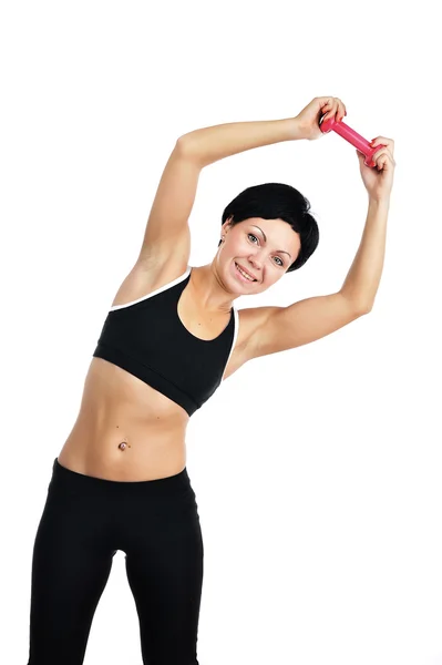 Portrait de jeune femme de fitness avec un haltères — Photo