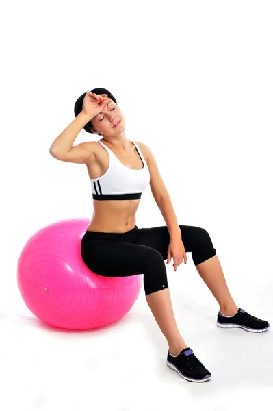 Young woman with a fitness ball — Stock Photo, Image