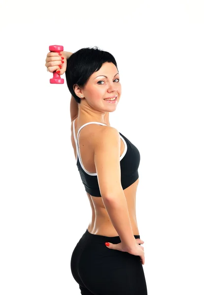 Portrait of young fitness woman with a dumbbells — Stock Photo, Image