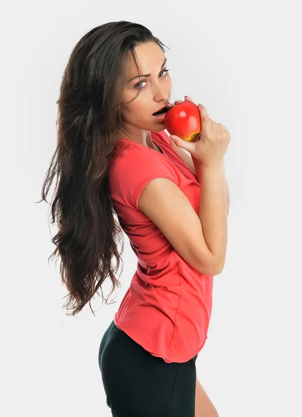 Portrét mladé fitness ženy s apple — Stock fotografie
