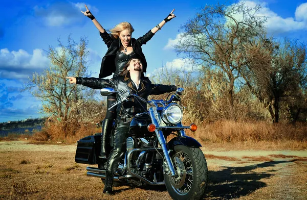 Couple on a bike — Stock Photo, Image