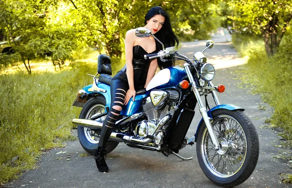 Young beautiful woman and bike — Stock Photo, Image