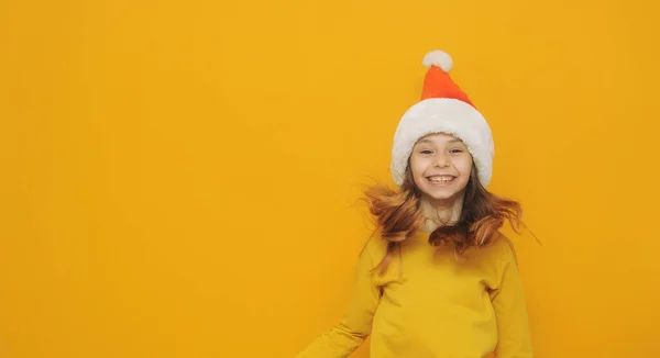 Adorable Little Girl Santa Hat Yellow Background Space Text — Fotografia de Stock