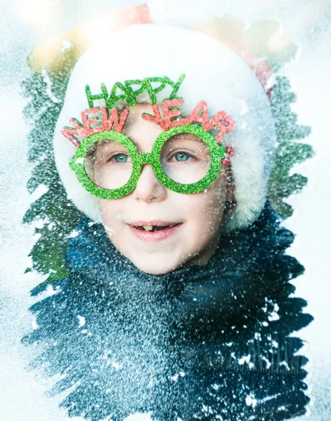 Boy Santa Claus Costume Looking Throught Snowy Window Happy New — Stock Fotó