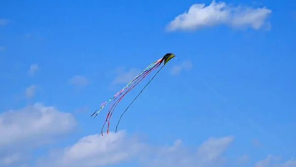 Colored Kite Flying Blue Cloudy Sky — Stock Photo, Image