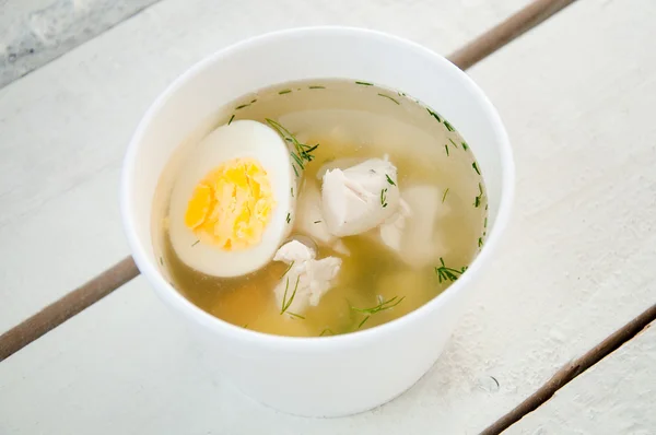 Chicken soup with noodles and boiled eggs — Stock Photo, Image
