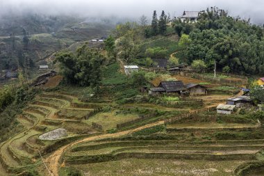 Farming village in the highlands of Vietnam. clipart