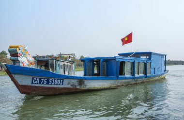 Vietnam Hué: police boat on the perfume river collecting fees.
