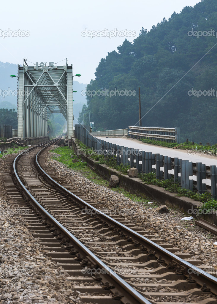 Vietnam: train bridge and track.
