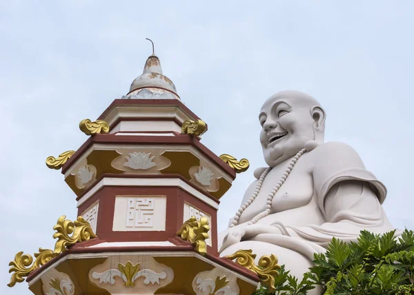 Buddha tvář v kombinaci s horní části památníku stúpa. — Stock fotografie