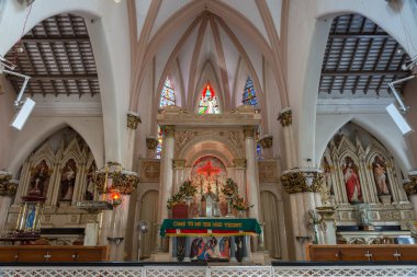 The chancel altar area of Saint Mary's Cathedral in Bangalore. clipart