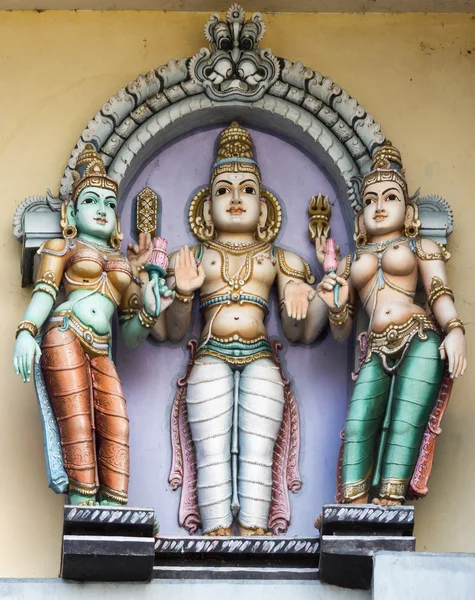 Lord Murugan og hans to koner, Valli og Deivayanai . – stockfoto