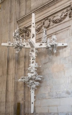 London, England, UK - July 6, 2022: St. Paul's Cathedral. Closeup, large white modern-art WWi Commemorative cross by Gerry Judag representing settlements destroyed by WW1 against nave wall