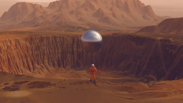 Orange Spaceman Spacewoman Large Alien Silver Sphere Crater Arid Desert — Stock Photo, Image