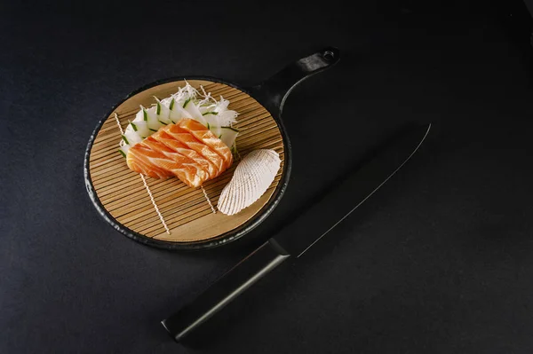 Salmon Sashimi Black Knife Black Background — Stok fotoğraf