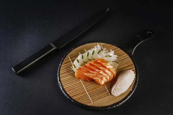 Salmon Sashimi Black Knife Black Background — Stok fotoğraf