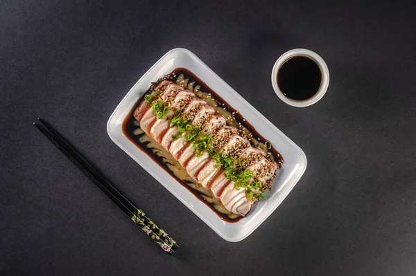 Blowtorcherd Salmon Sashimi Sesame Shoyu Passion Fruit Sauce Black Table — Stok fotoğraf