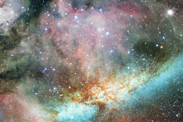 Dış uzay sanatı. Starfield. Harika bir nebula. Bu görüntünün elementleri NASA tarafından desteklenmektedir.
