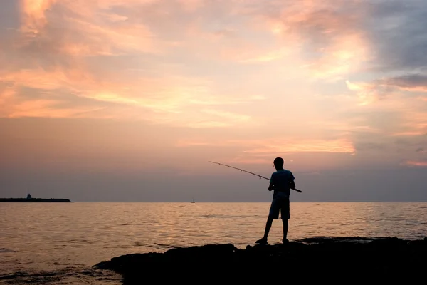 The lonely fisherman — Stock Photo, Image