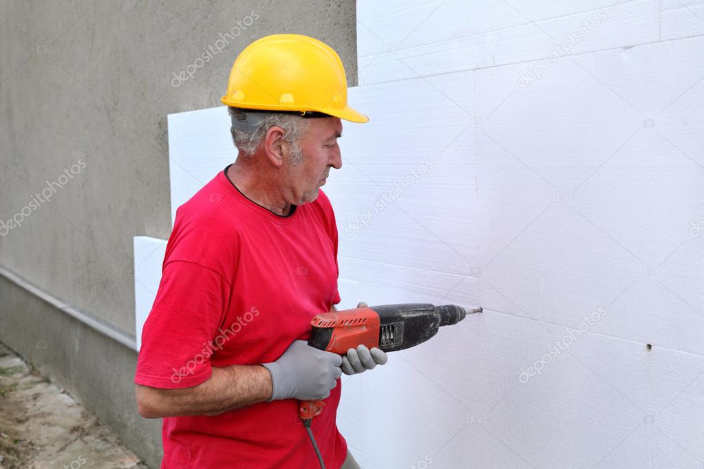 Construction site, styrofoam insulation drill