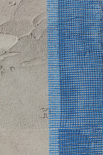 Wall insulation, mortar and mesh — Stock Photo, Image
