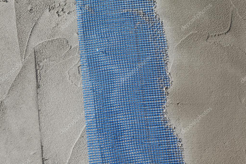 Wall insulation, mortar and mesh Stock Photo by ©simazoran 47814551