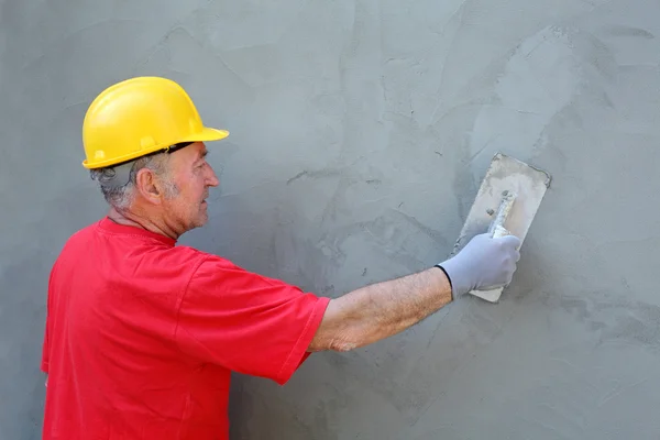 Worker making facade — Stock Photo, Image