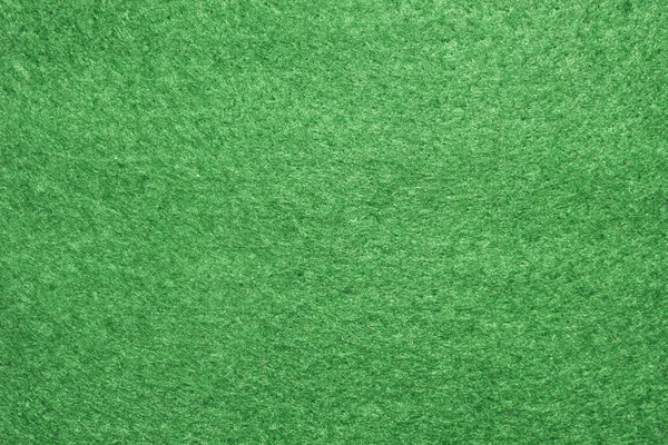 Green felt texture.