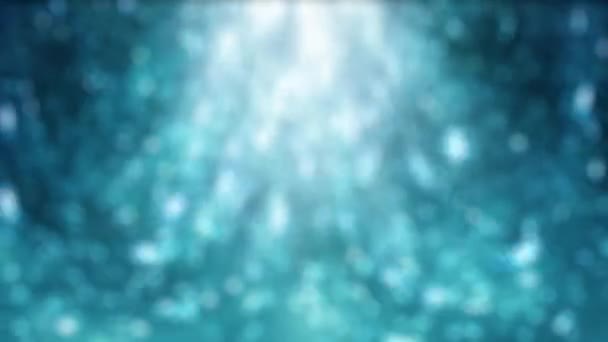 动感发光粒子的解焦蓝色圣诞节背景 — 图库视频影像