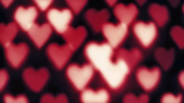 Looping Valentijnsdag Achtergrond Van Een Hartvormige Bokeh Gemaakt Met Kaarslicht — Stockvideo