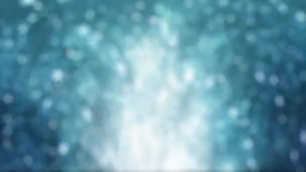 爆発する光の粒子ストリームのループアニメーションに焦点を当てた抽象的な青クリスマスの背景 — ストック動画