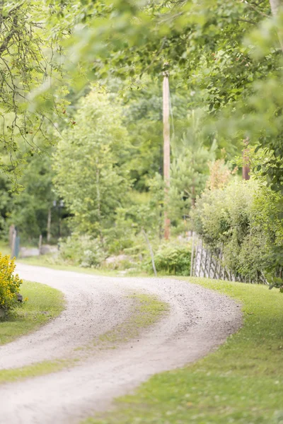 Gravel road in rural landscape, Sweden — Stock Photo, Image