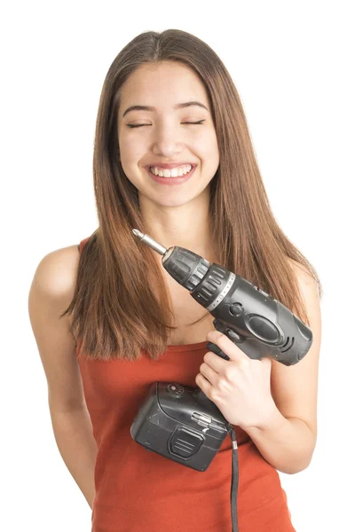 Attractive young woman holding cordless screwdriver — Stock Photo, Image