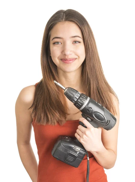 Attractive young woman holding cordless screwdriver — Stock Photo, Image